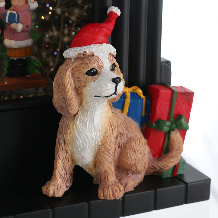Dog figurine wearing a Santa hat with Christmas presents in the background