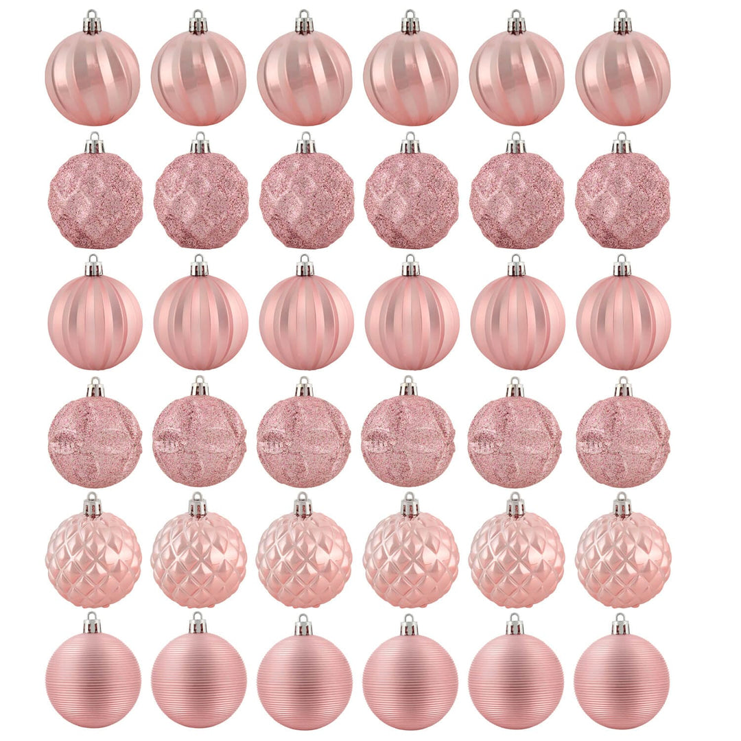 Set of thirty six pink Christmas tree baubles in various designs