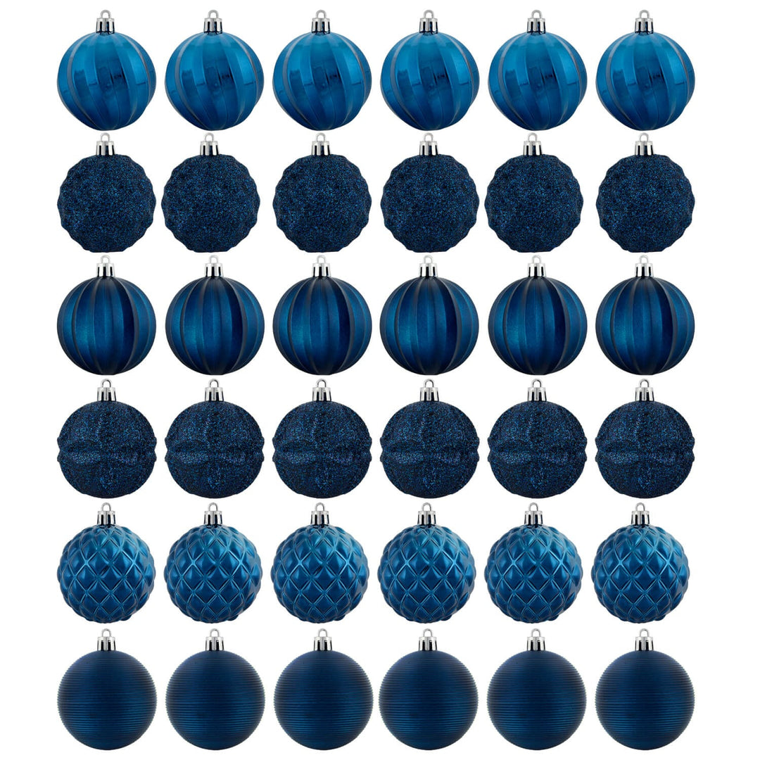 Set of thirty six navy blue Christmas tree baubles in various designs