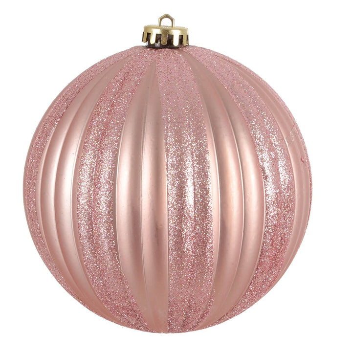 Very Large pink glittery Christmas ball ornament on a white background
