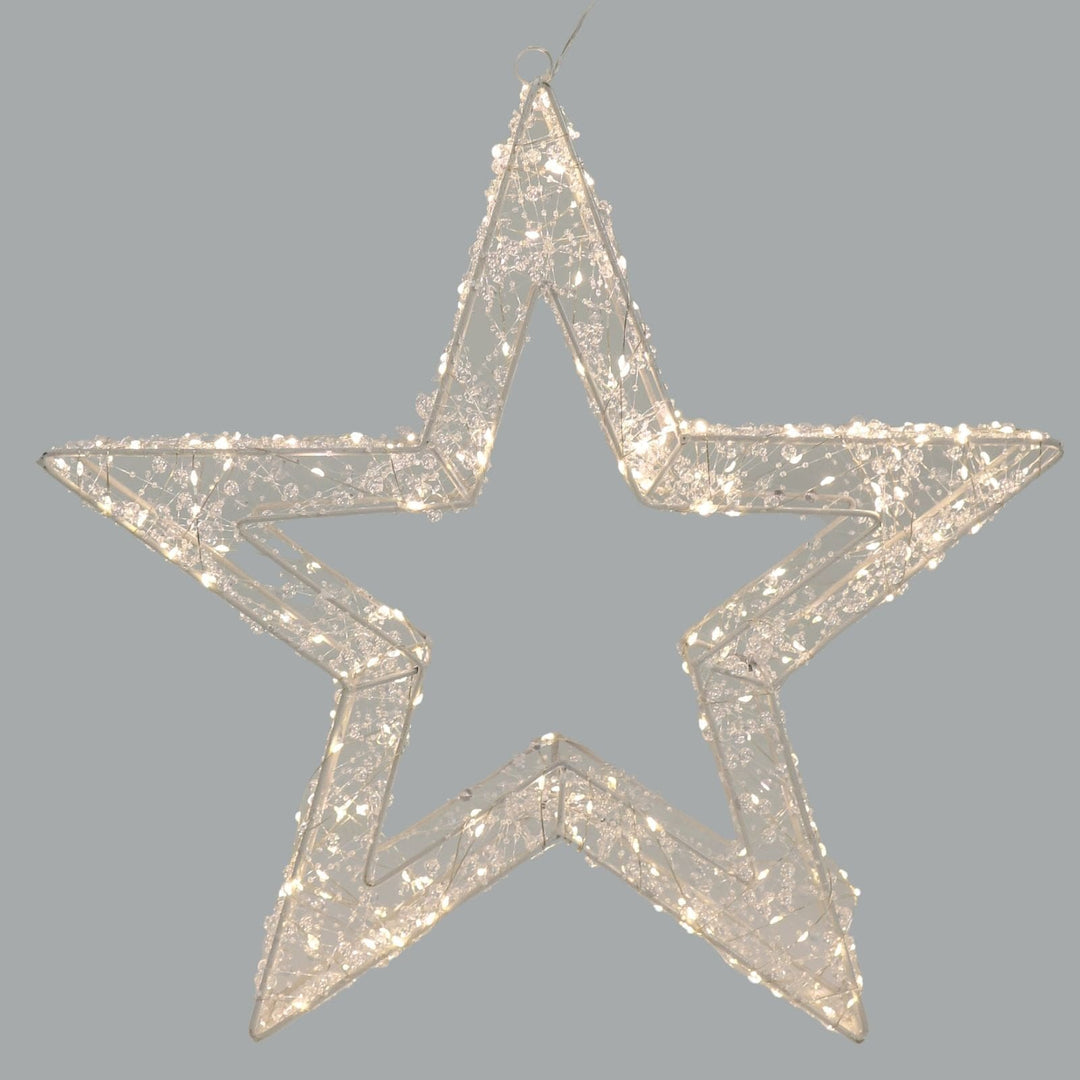 Decorative star with clear lights on a grey background