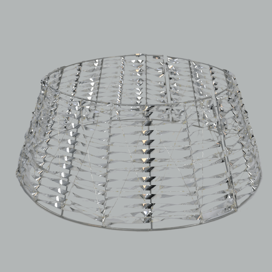 silver tree skirt with lights turned off and silver PET material