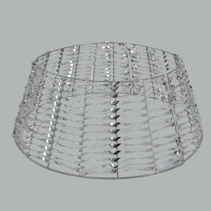silver tree skirt with lights turned off and silver PET material