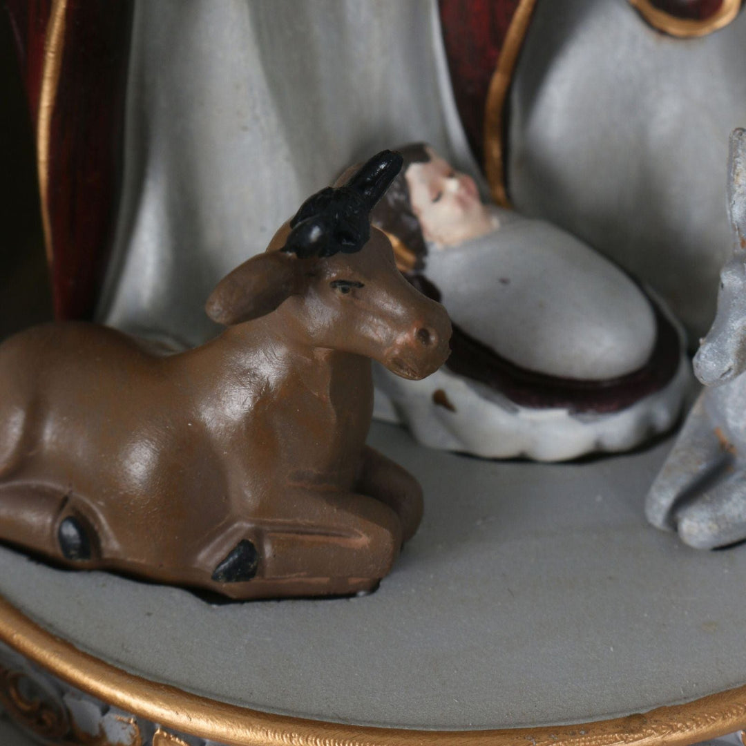 detail shot of cow figure in nativity scene