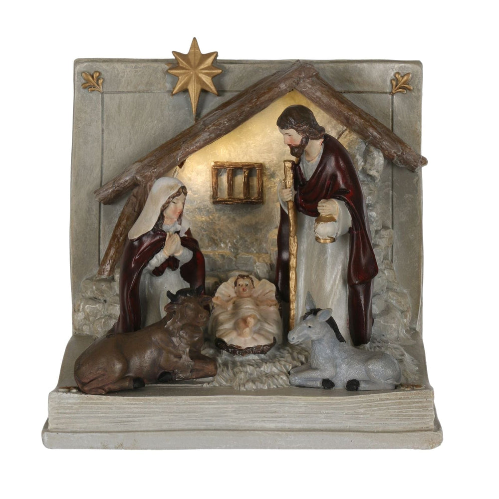 front view of nativity book ornament with mary, joseph, baby jesus in manger, donkey and cow animals