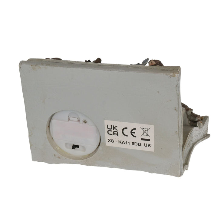 battery compartment with certification label on a white background