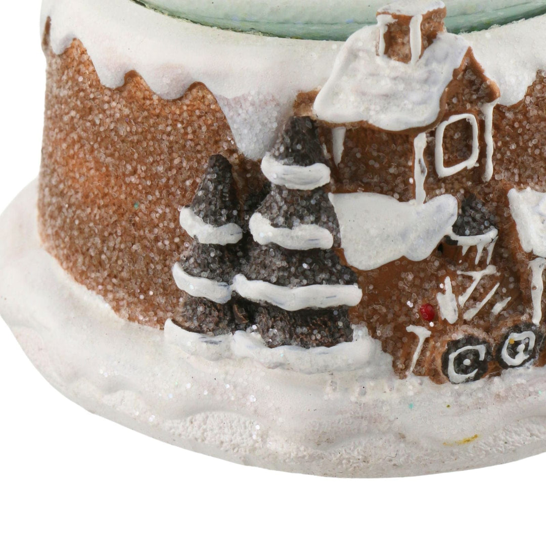 sugar style Gingerbread house with snow and trees on a white background