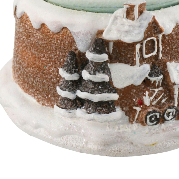 sugar style Gingerbread house with snow and trees on a white background