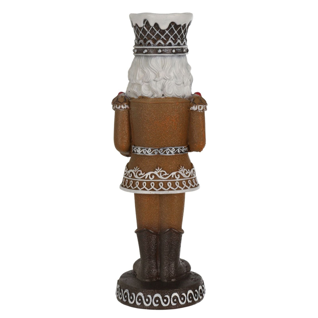 back view of nutcracker figure wearing icing crown