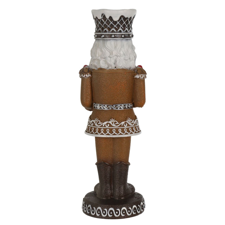 back view of nutcracker figure wearing icing crown