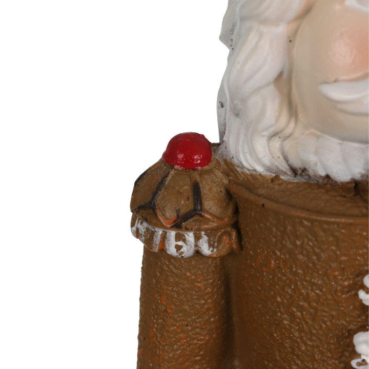 close up of nutcracker figure with cherry style shoulders on outfit