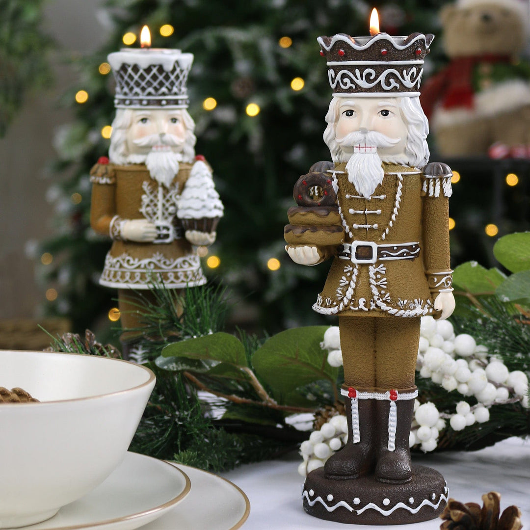 Decorative nutcracker figure with a candle on a festive table setting.