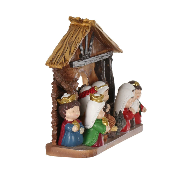 Nativity scene figurines on a white background