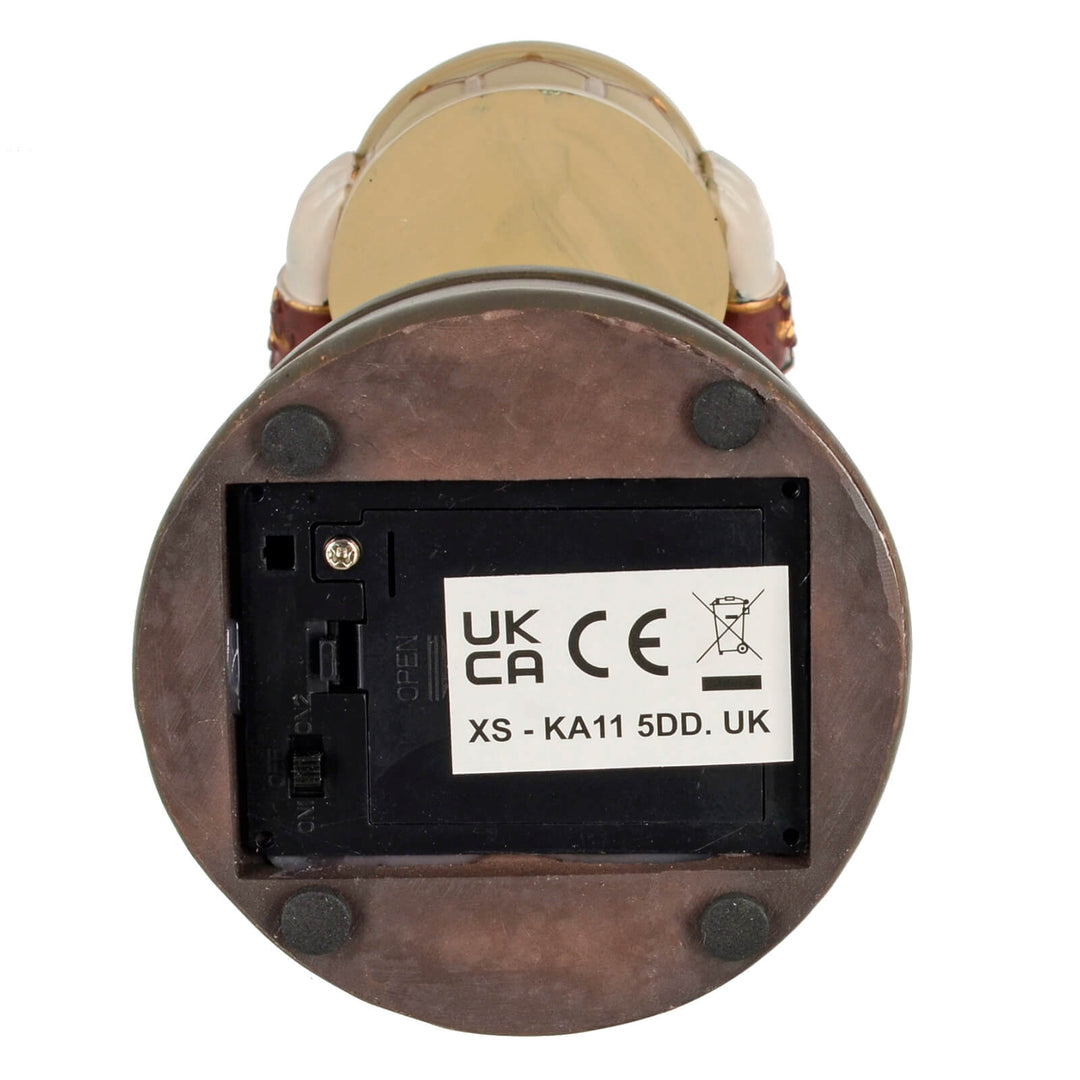 Base of a figurine with CE mark battery compartment
