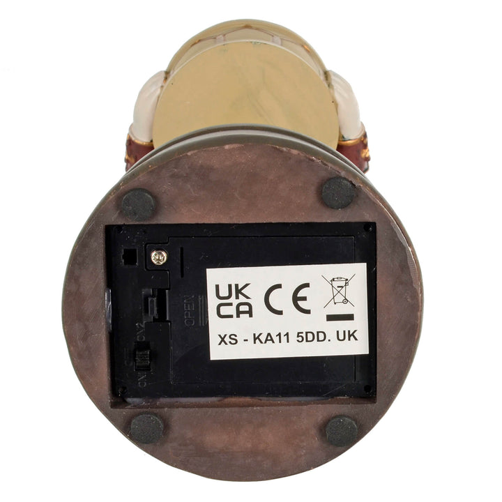 Base of a figurine with CE mark battery compartment