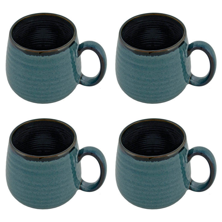 Set of 4 sea green coffee mugs with large handles on a white background