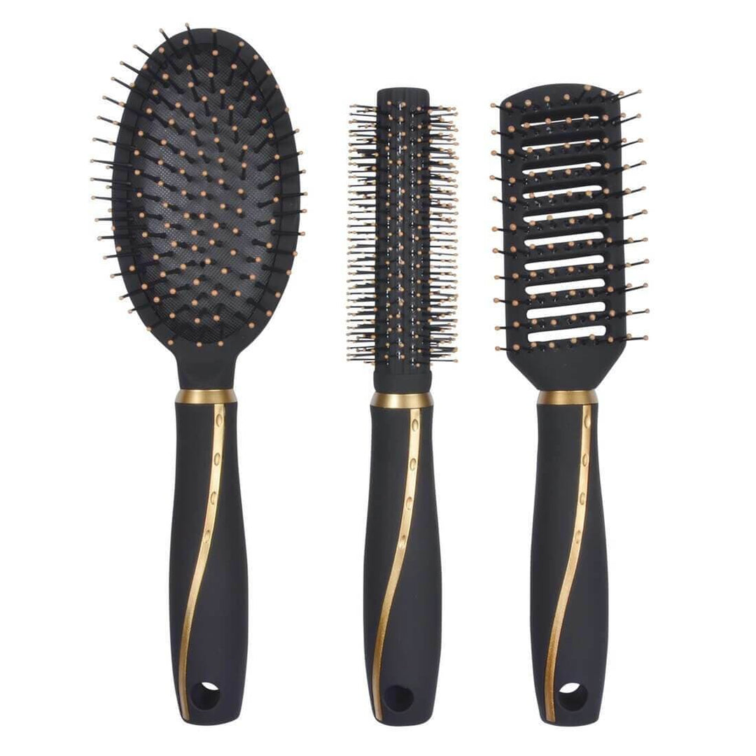 Set of hairbrushes and hair accessories on a white background