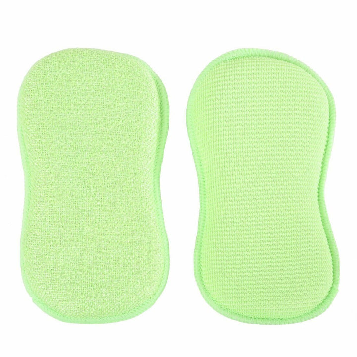 2 green cleaning pads with soft fibre side and a nylon scrubbing side
