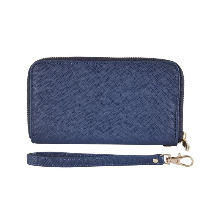 Navy faux leather purse with wrist strap on a white background
